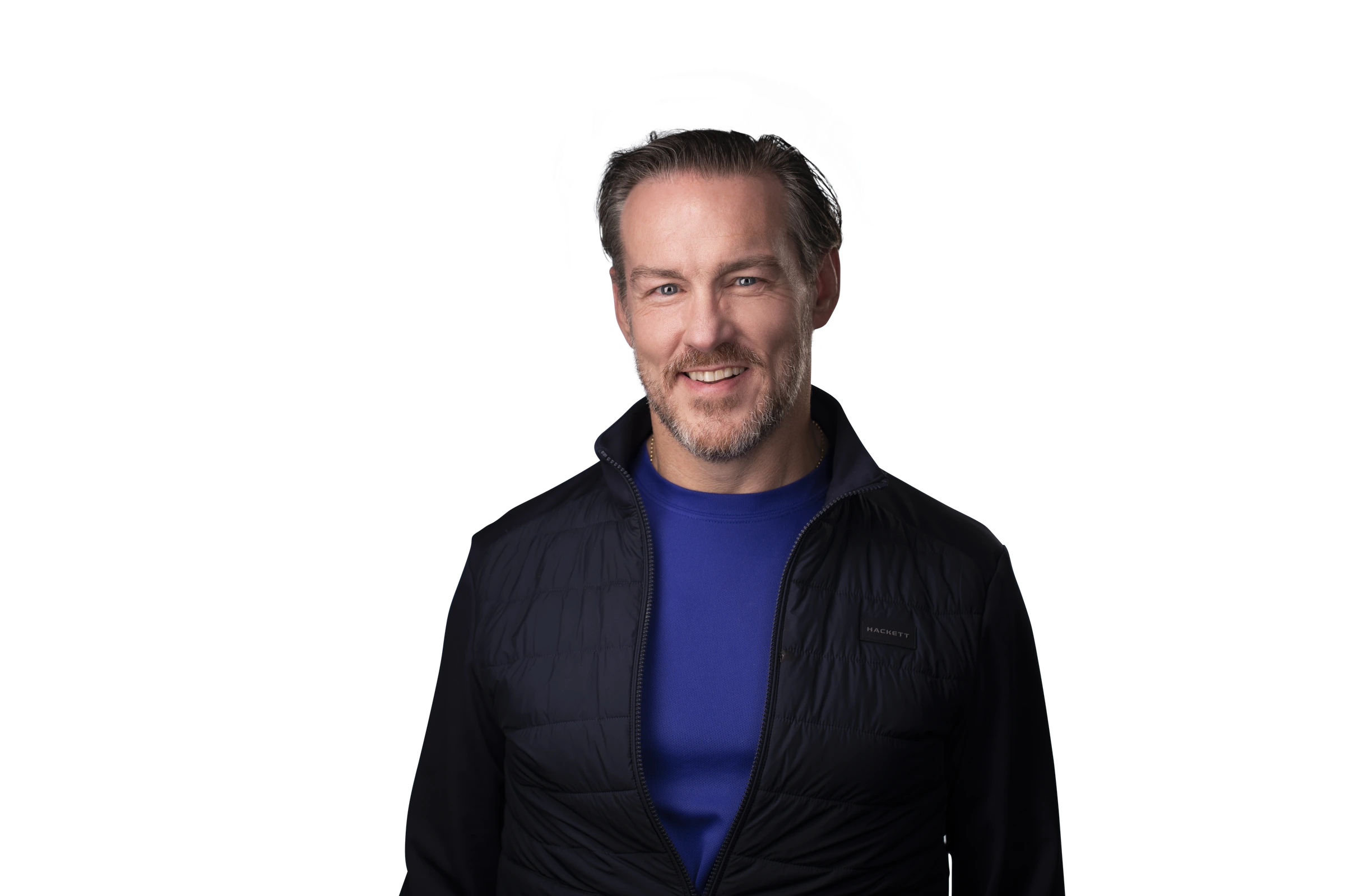 Portrait of Shay Lynch in a black jacket and blue t-shirt