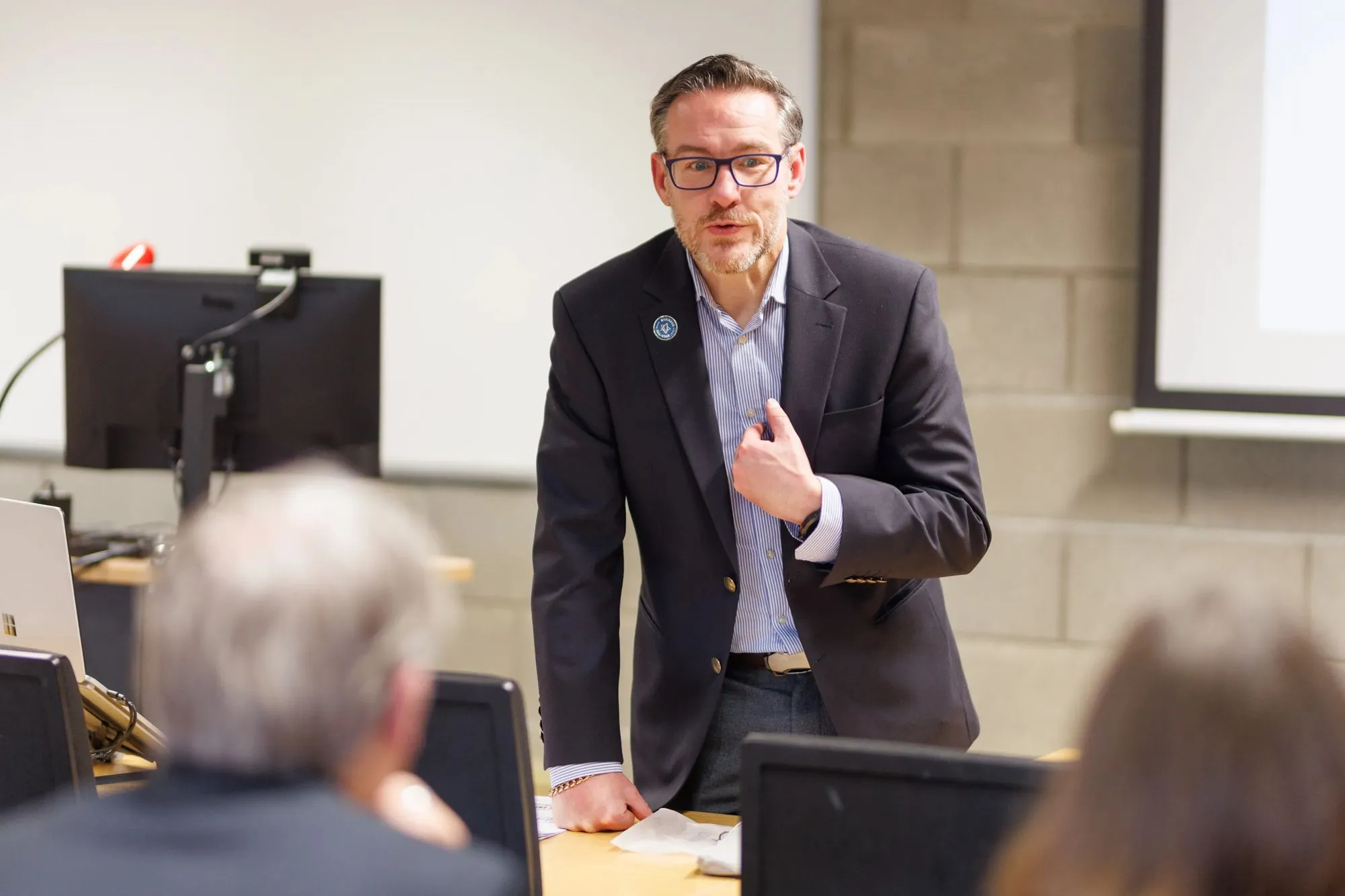 Shay Lynch speaking at a corporate university event